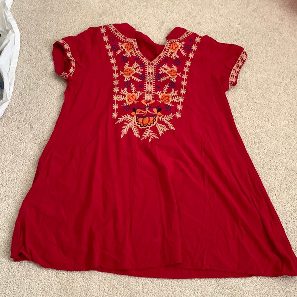 Sleeves are a bit small. Material is thin.